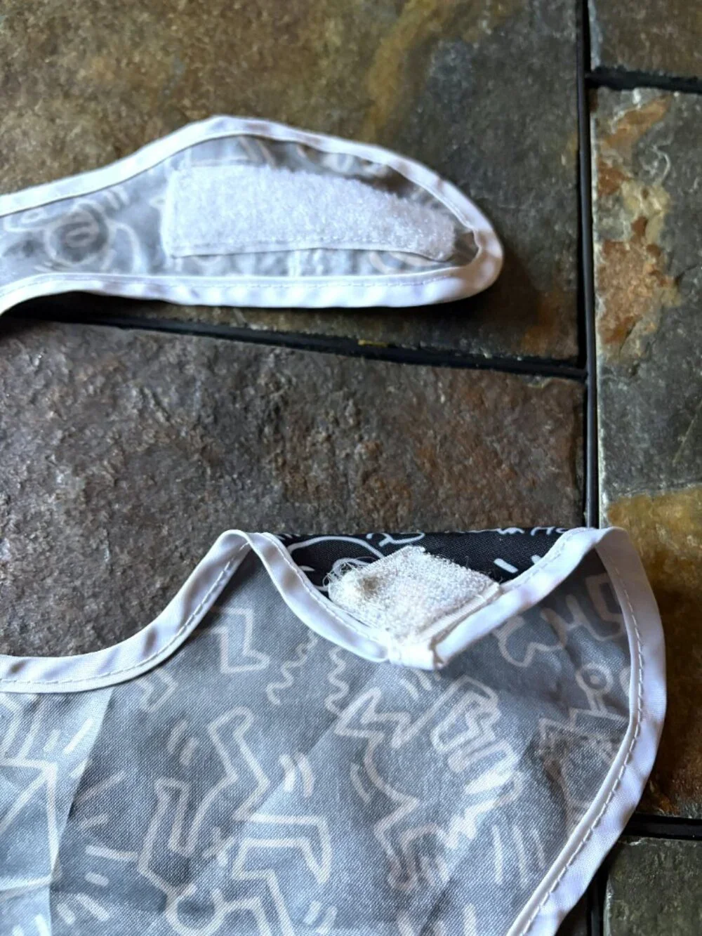 Keith Haring x Bumkins baby bib pop art black white red